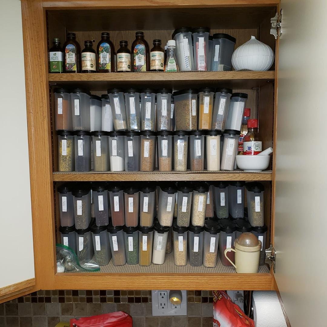 My spice cabinet all reset with Tupperware
