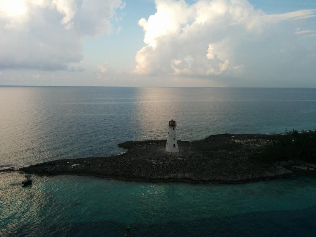 Pretty good for a cell phone shot. The lighthouse leaving Nassau, Bahamas port.