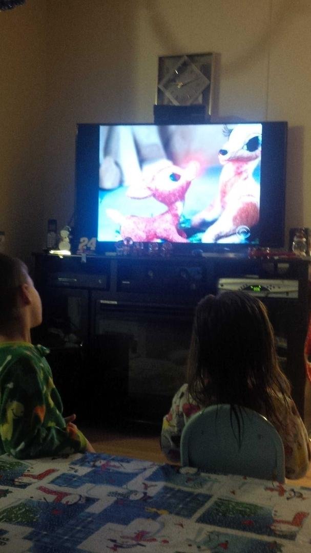 Watching my favorite Chritsmas. Special with Logan and Aubry.