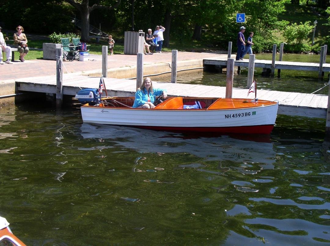 Charlene in our 1948 Lyman at Wolfeboro docks.