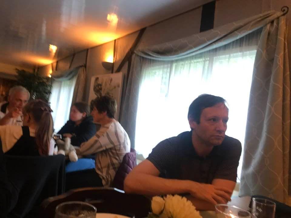 Melanie’s husband,Peter,with other family members in the background.