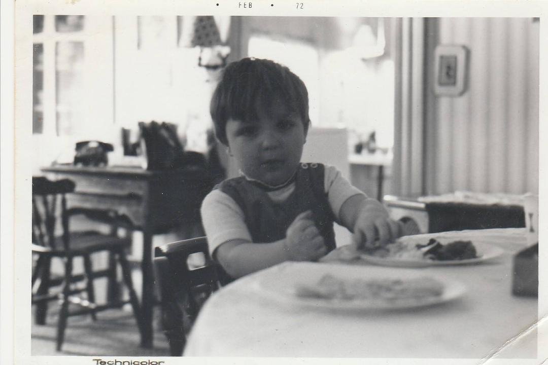 My son Mike eating at grandma's house
