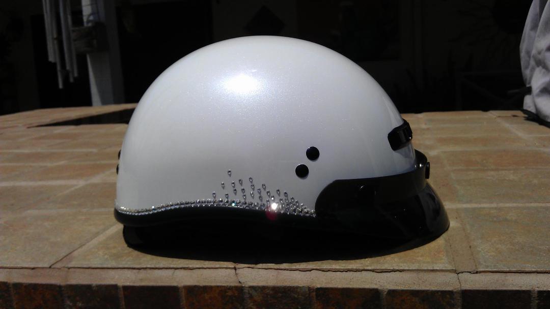 Fun with epoxy and swarovski :) What every girl's helmet needs!