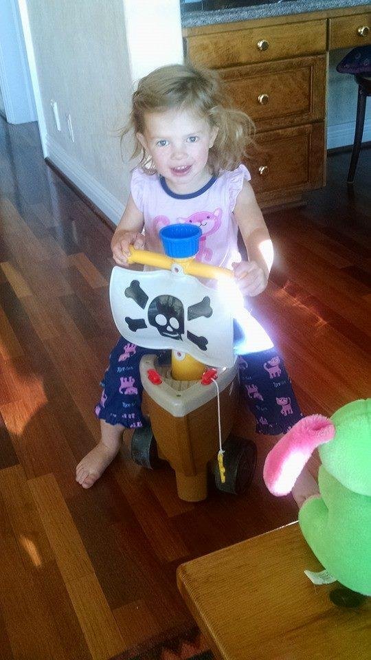 Papa and Granny babysitting the Dreaded Pirate Makenna on her pre dawn raid of the special snacks hiding place.