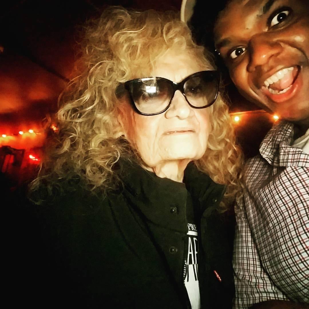The great young producer/comedy artist Todd Montesi posing with, in New York City, Beverly Ross, legendary woman pioneer Rock composer, at the East Village UG Comedy Show in Oct 2017- me, da buellermesiter, was there to do