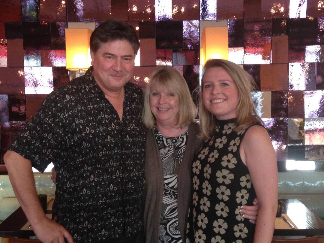 Proud parents with daughter at her YouTube meeting