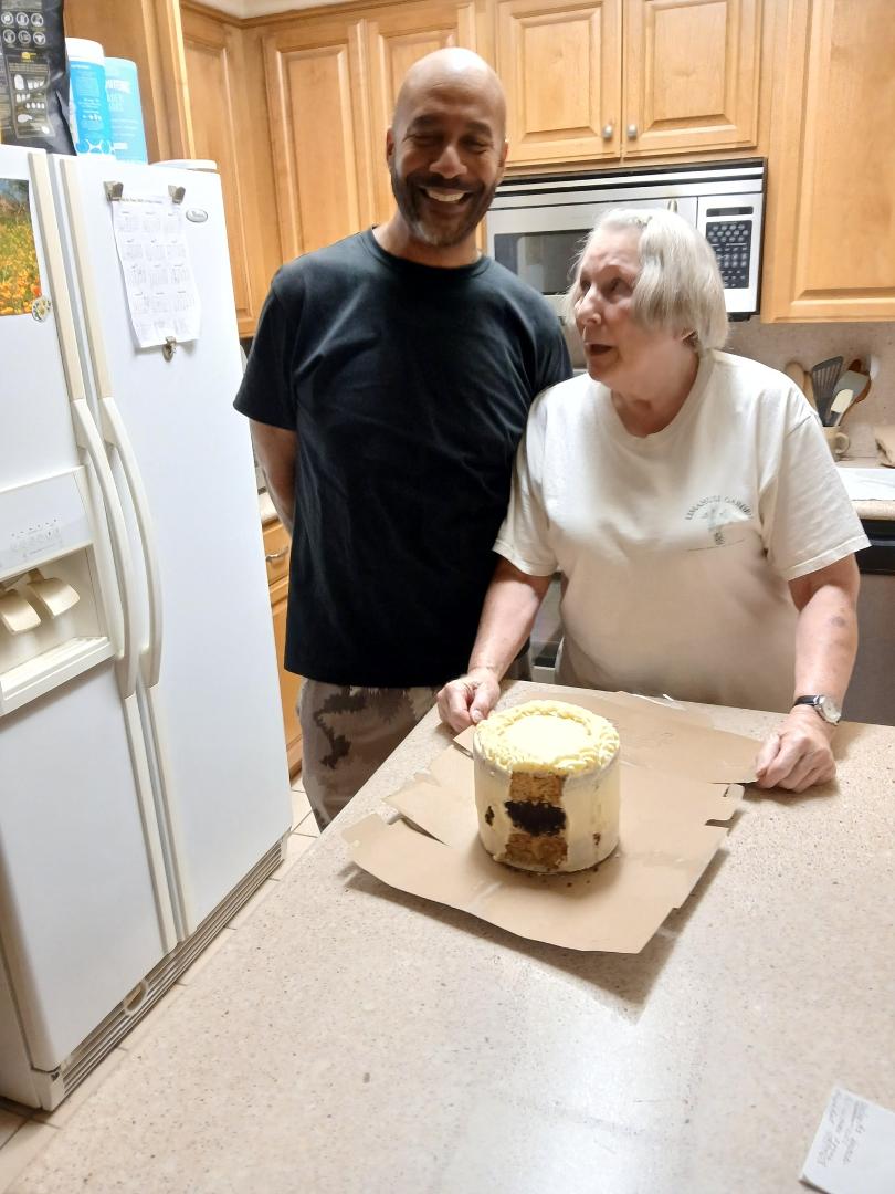 Zek baked a gluten-free Birthday Cake (at his COCO LUV bakery) for Joan.