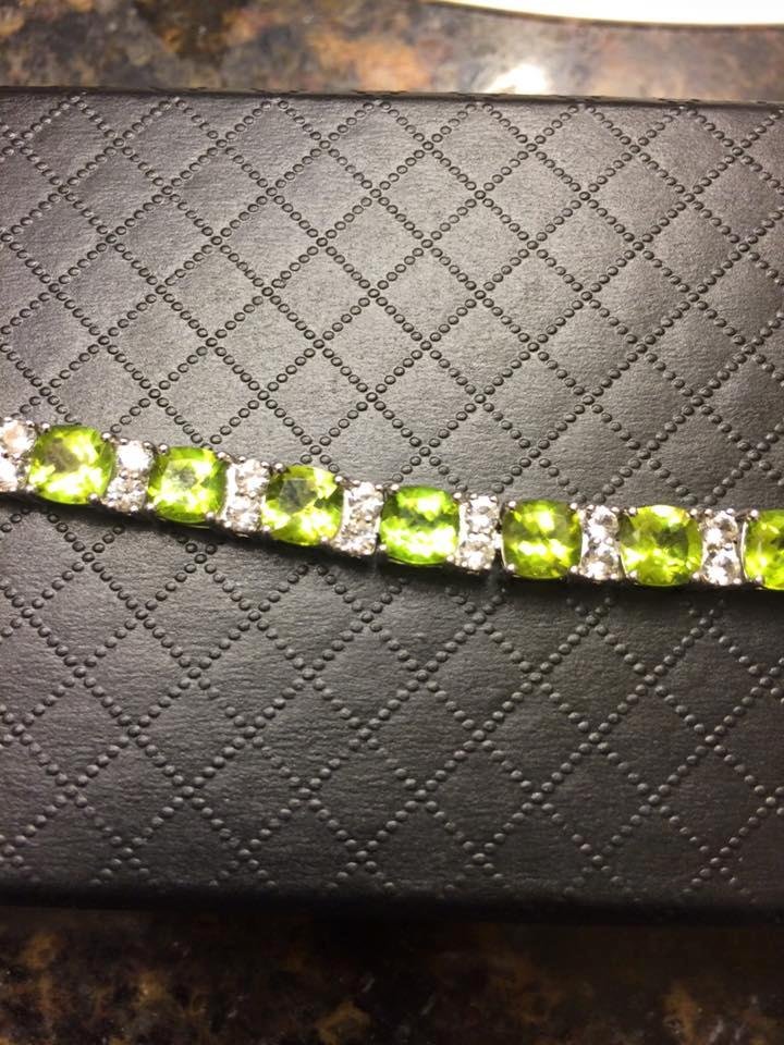 The bracelet Dennis gave me for my birthday - peridot and diamond.  He knows I love green!!
