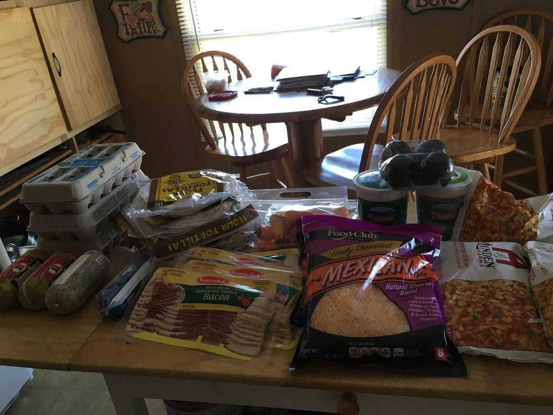 5 lbs of bacon, 4 lbs of sausage, 4 lbs of cheese, 4 lbs of chopped green chile, 1 lbs of sweet peppers, 4 avocados and 6 lbs of hash browns. Time to get to work.
