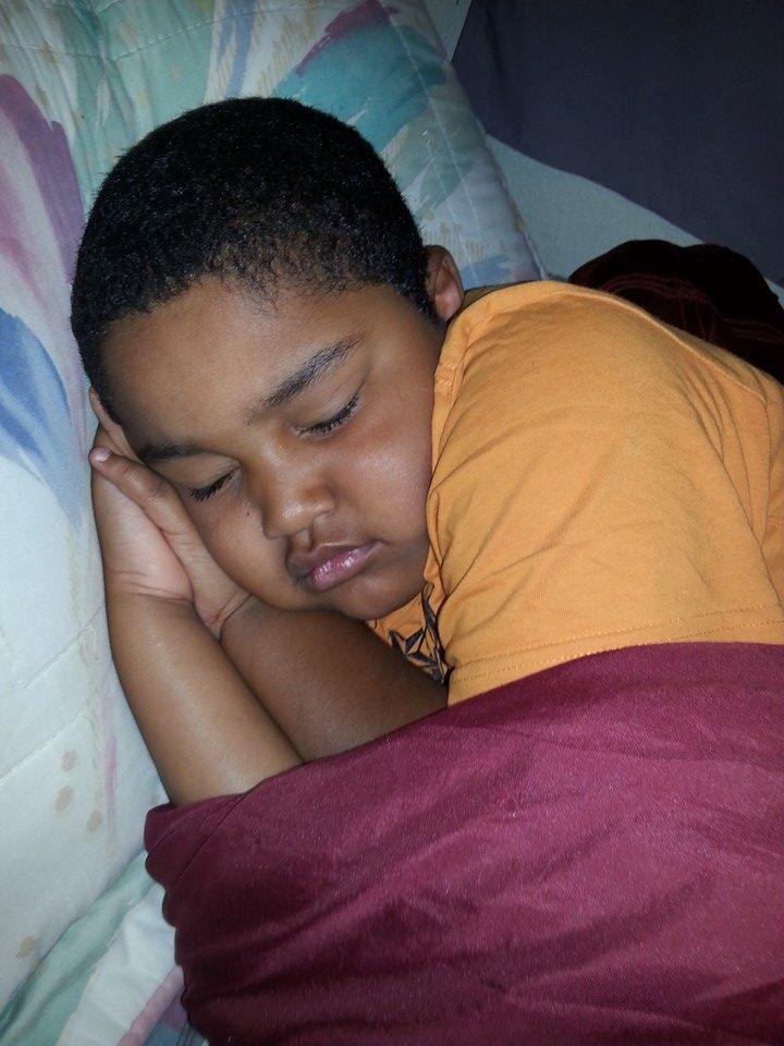 Look at my lil big son so peaceful and asleep getting energized for another day tommorro to give us hell....