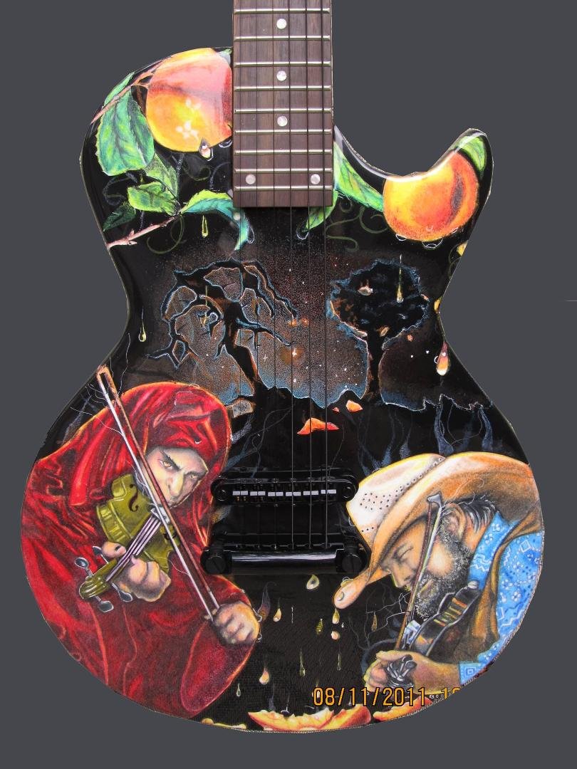 Made $10,000 for the Angelus with my guitar. It was bid on by Charlie Daniels on the 38th anniversary of this song...and another one will be made to hang in the Hard Rock Hotel in Tampa. I am very thankful today for my gift