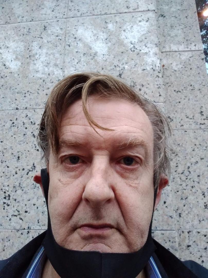 Mug shot selfie.