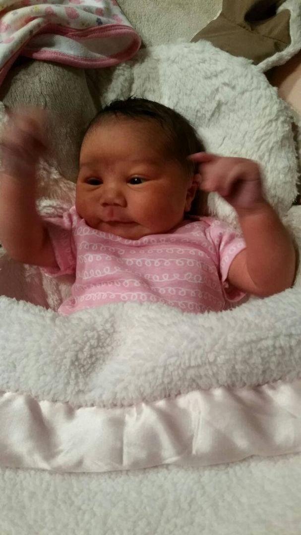 My newest grand at 1 week old. Can't wait to hold her in June.