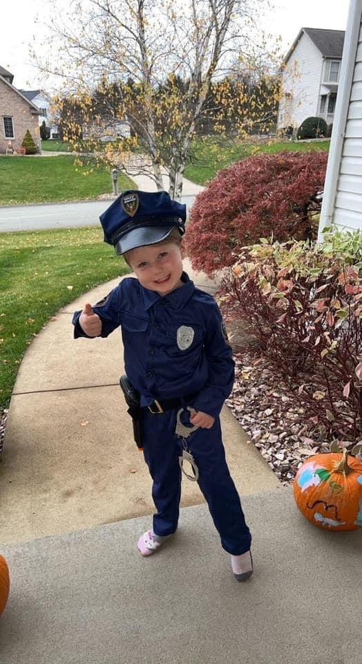 This is our little Aubree my Great Granddaughter the Halloween Cop with handcuffs and her gun. That’s what she wanted to be. Aubree looks exactly like her Dan when he was 5 years old too.