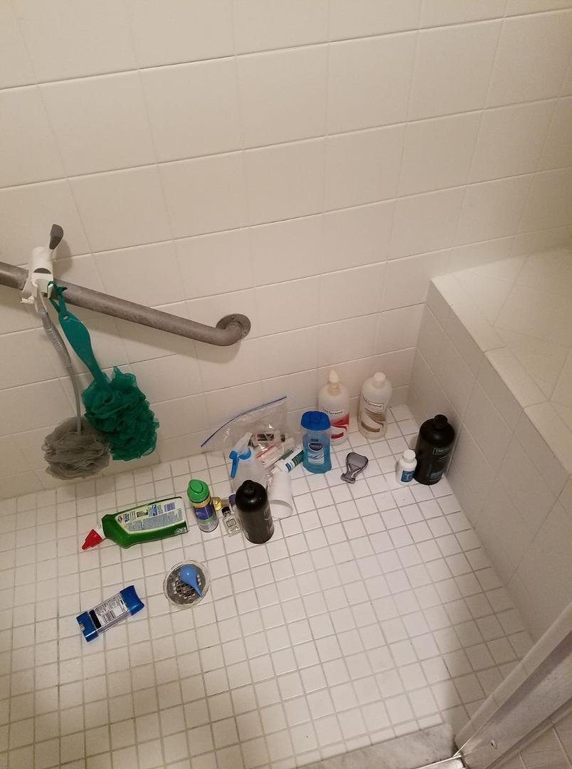 Heather fought to give the cat a shower, but i think the cat won.