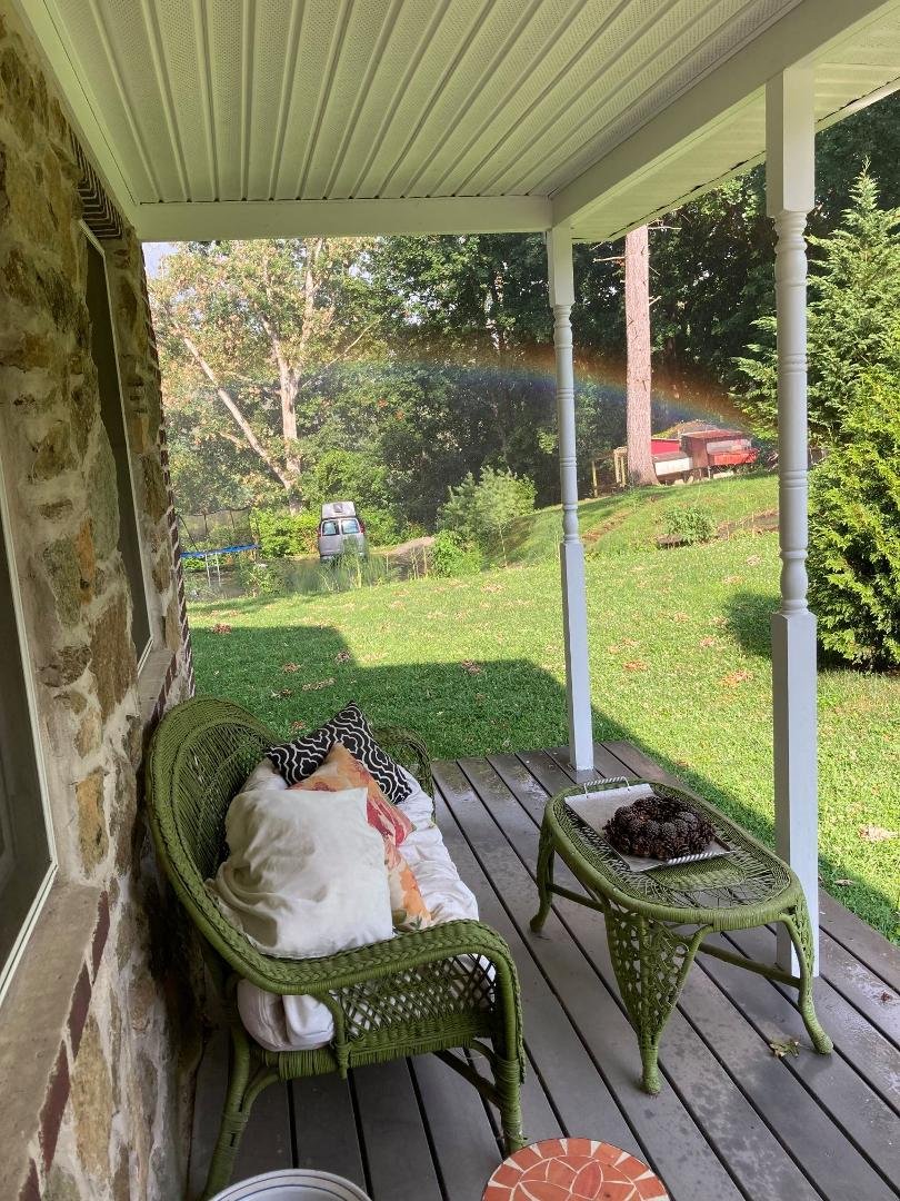 So, this happened. Sitting on my porch and saw a rainbow appearing as if it were only a few feet away. I have never seen a naturally occurring rainbow so low to the ground and so close.