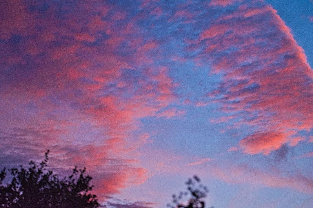 Pat's Birthday sunset 21 Oct. 2021 Clouds in the wind like her.