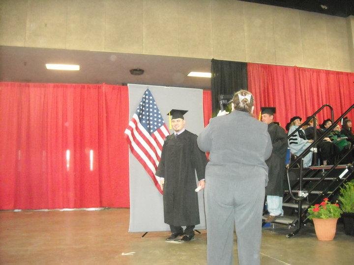 He is getting his picture taken