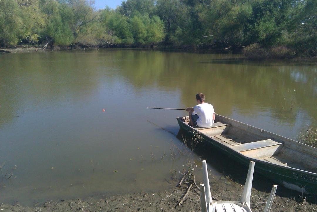 Fishing with the Grandson on one of our stock tanks.