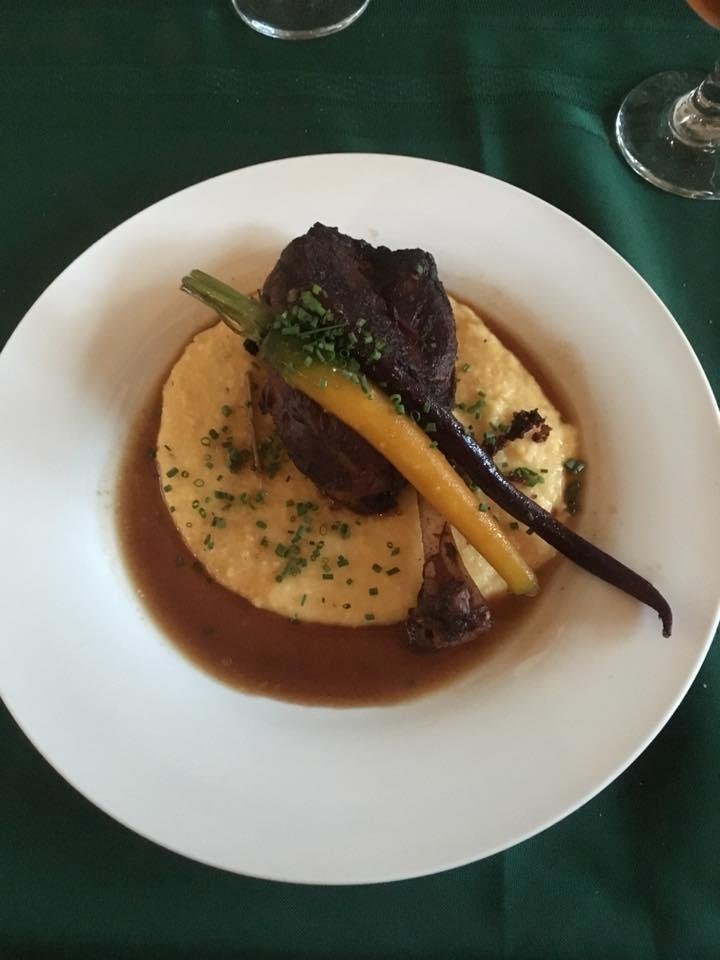 Malt rubbed pork shank over smoked gouda grits.