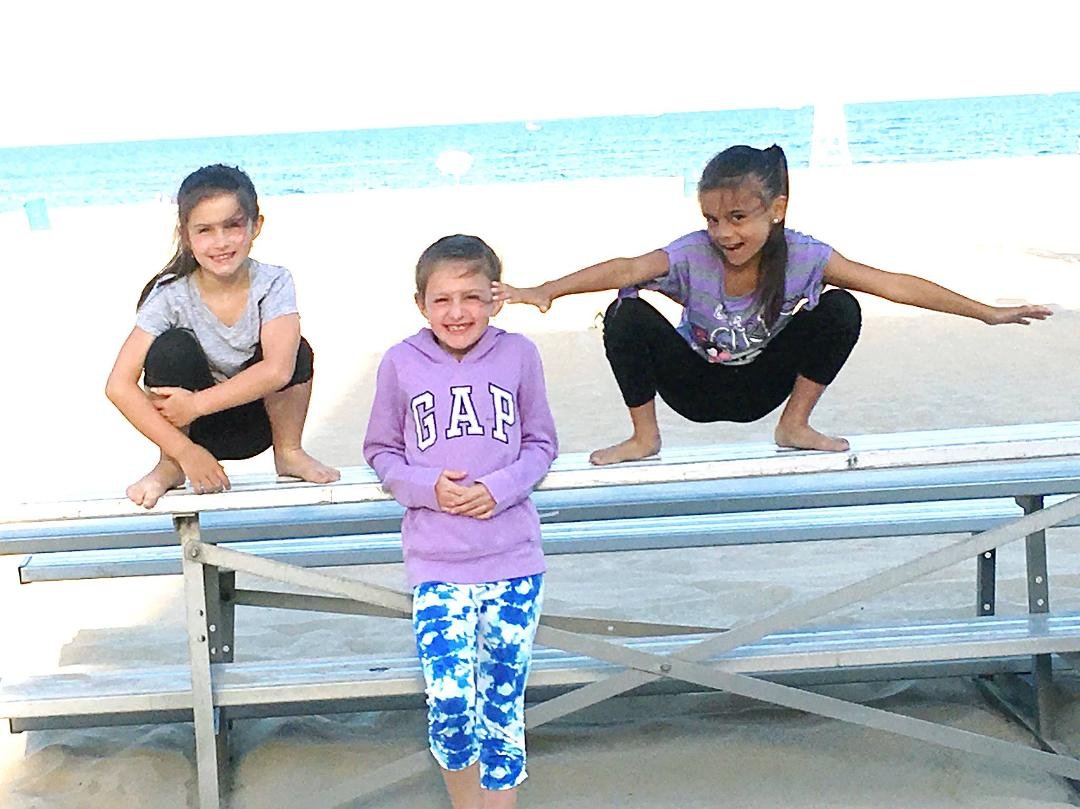 Courtesy of Beth Specht, here is Bella letting out her inner Santa Barbara grrl with her friends in Delaware.