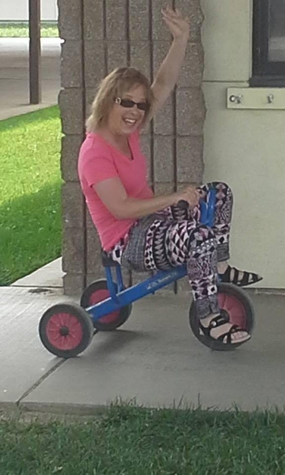 This goes to prove you're never too old to have fun cathleen Chapman on her three wheeler