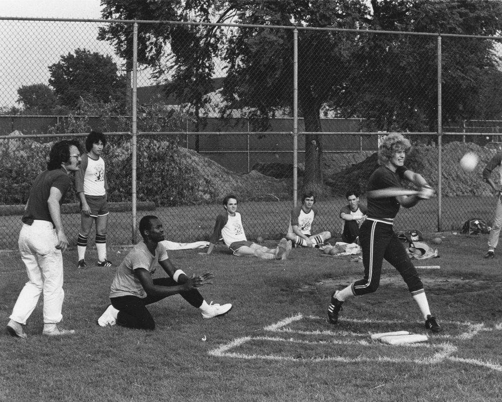 I found this photo of our summer softball team on the University of Chicago Photographic Archive, dated 7/21/82. At bat, of course, is Mark Prouty. Along the back fence from left to right are John Burke, Robert Cram, unknow