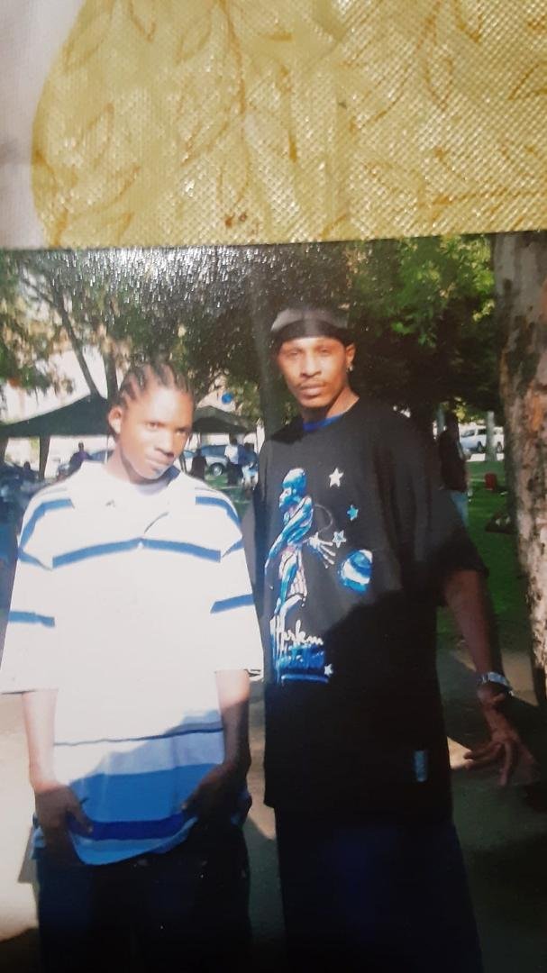 A young LZ Tukaveli and Dre Knocca at a family reunion in 2007