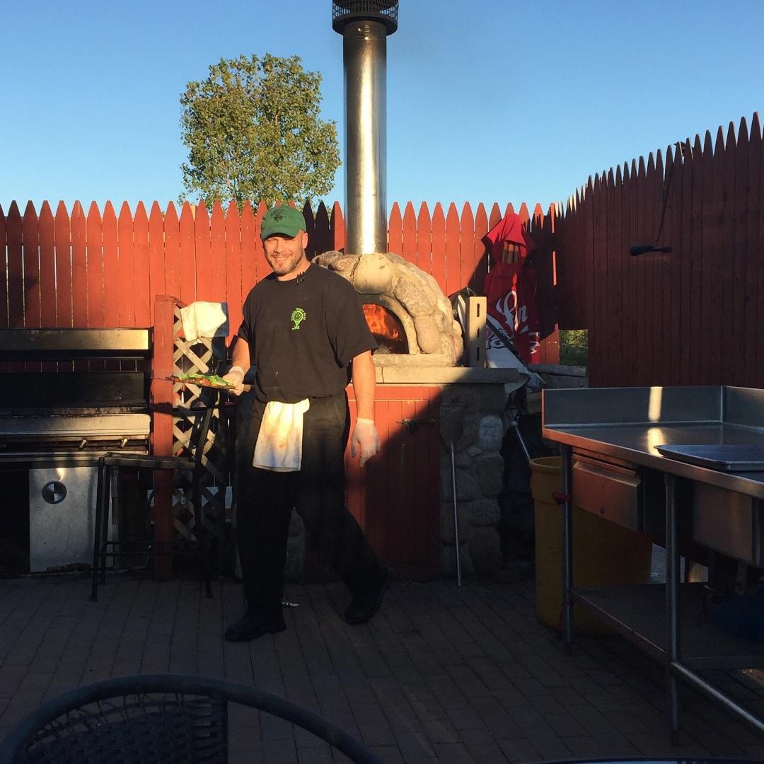 Bill hard at work making the excellent thin crust pizza