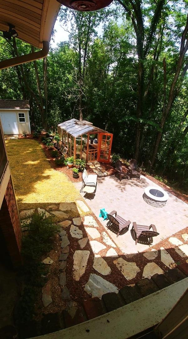 our improved back yard. When the grass grows back, it should serve us well. (Crystal, no koi pond due to raccoons, foxes and such. 😖) 

And yes, David is harvesting tomatoes and cukes. He's also starting the 2nd crop of ve