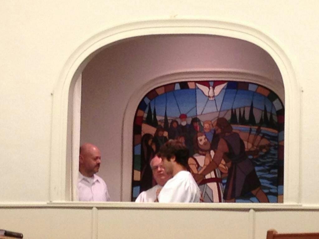 Our grand son Stephen was baptized this morning at Laurel Hill Baptist Church. The pastor was Wellford Tiller and the youth worker who had so much influence on Stephen was Wayne Hannah joined them in the pool.