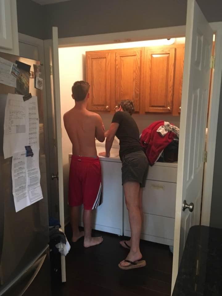 Nancy teaching Ryan how to do laundry