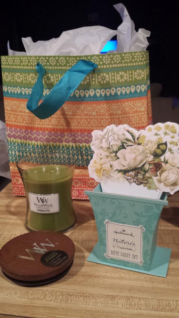 Got home and found I had a present from my friends Dionne Collins and Sang Baik. Thank you guys I Love it. I'm burning my candle tonight :)