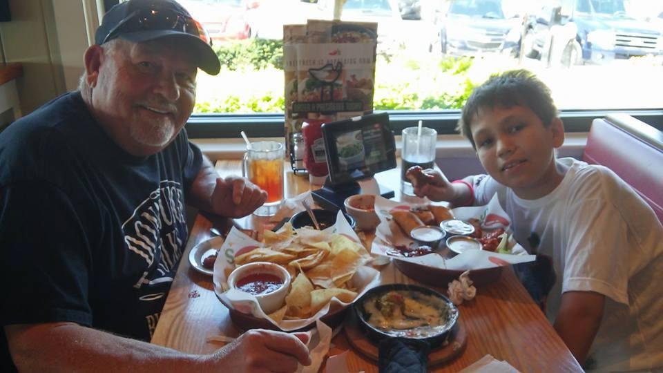Papa and Blaise on his 14th birthday eating lunch at Chilli's!