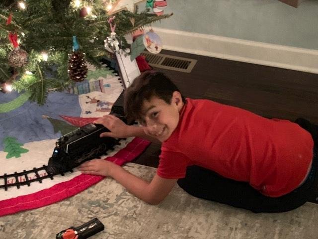 ahh. kids and Christmas....32 years earlier, I would swear this was his dad. Merry Christmas Nolan.