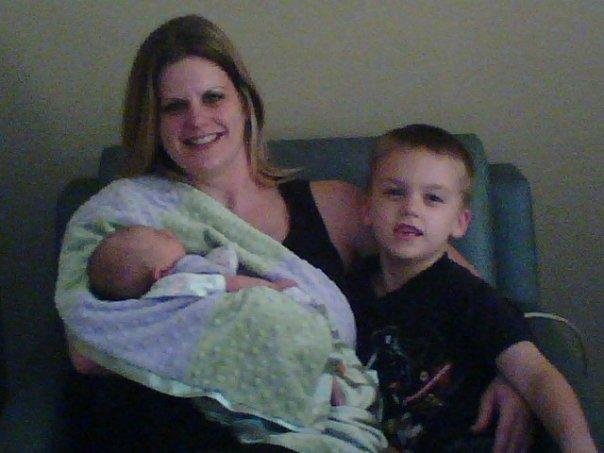 daughter sarah with her son gavin holding karly