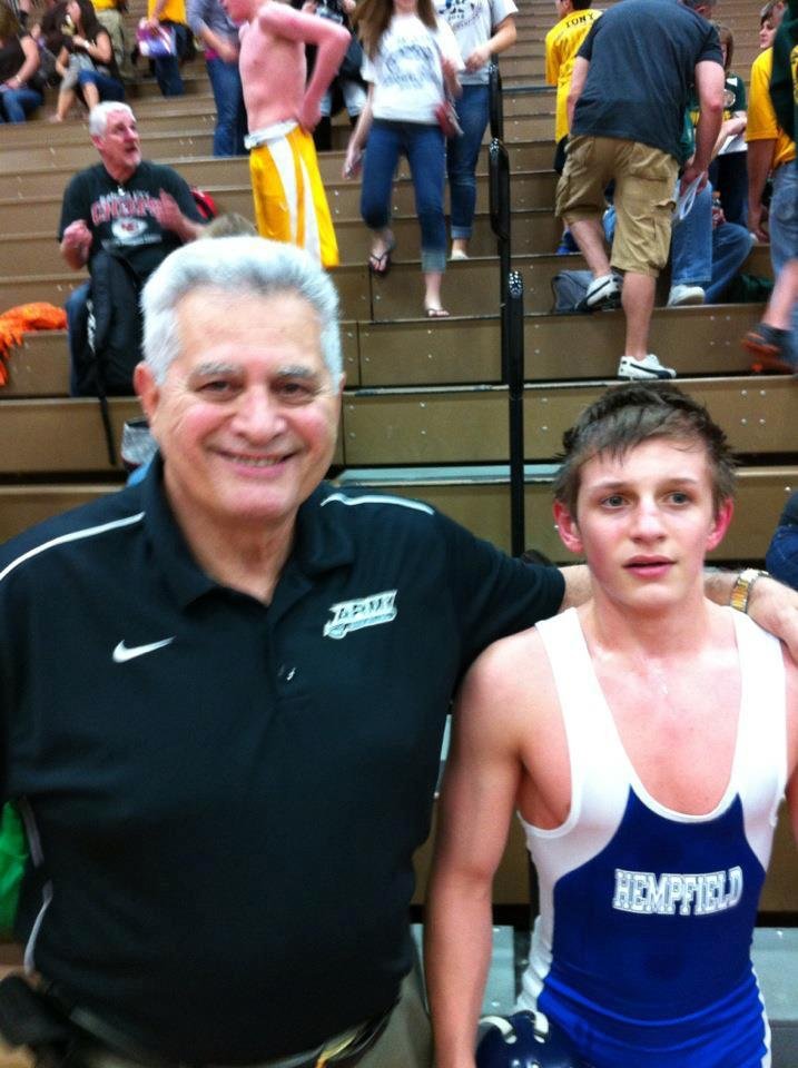 Nephew Tommy Abraham after big wrestling win in Area III tournament .