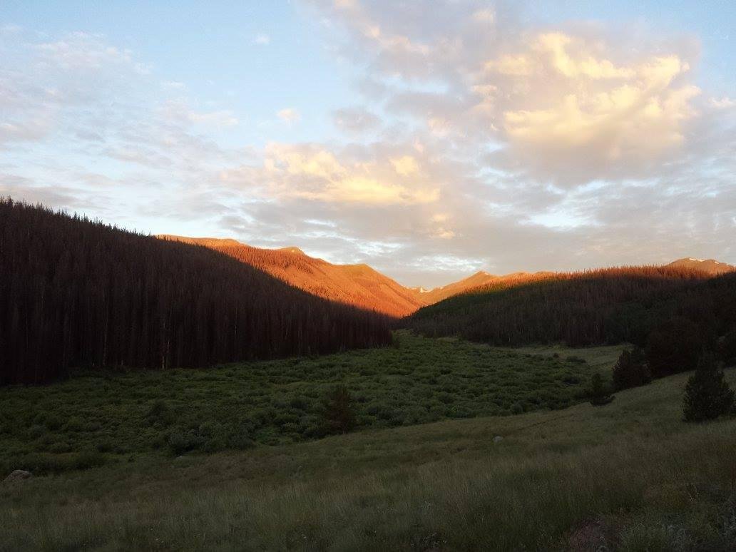 Sunrise on mountains ahead of us.