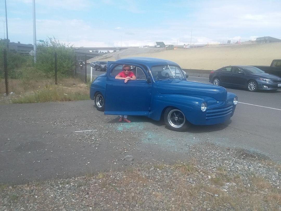 On the way to Karen's birthday party I ran out of gas in my new hot rod. She's going to be late.