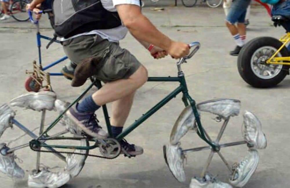 Usually, bikes from stores like Walmart have wheels and not a sneaker on each spoke. The logic behind this invention is almost unfathomable, especially as six pairs of sneakers will probably cost almost as much as a new bik