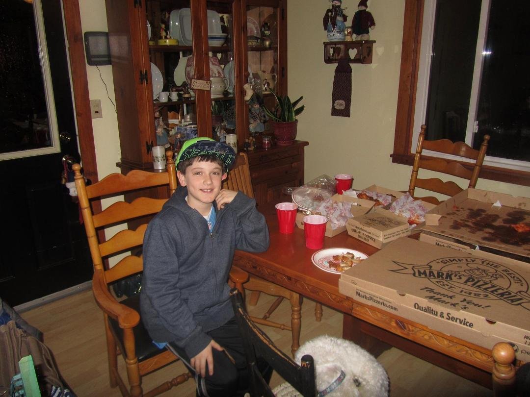 Zack checking out the pizza....