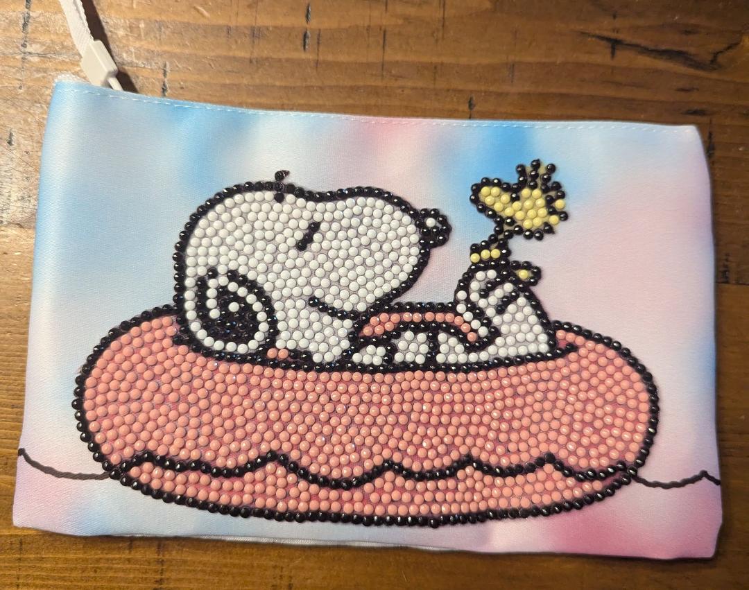 My daughter Taylor Pelayo really knows what I love !! She made me a Snoopy cosmetic bag ❤️