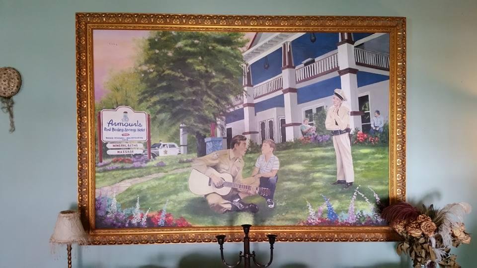 My sister Cecily A. WingSong works at the Armour hotel in Red Boiling Springs TN. The actor Roddy McDowell painted this piece combining the hotel with the Andy Griffith show.