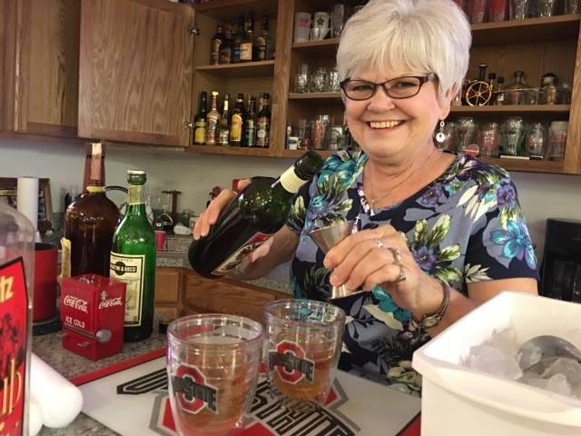 48 years ago this beautiful woman was my bartender at the Fontanelle Lounge. In August we will celebrate our 47th Anniversary. Here she was serving as Hostess/Bartender at our annual family & friends cookout. She has been