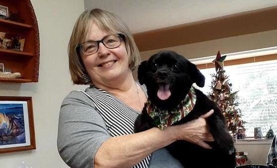 Janet holding Mya up. so Mya can send you all the joy and love of the season to your pets at this special time of the year... Mya just said and you also.