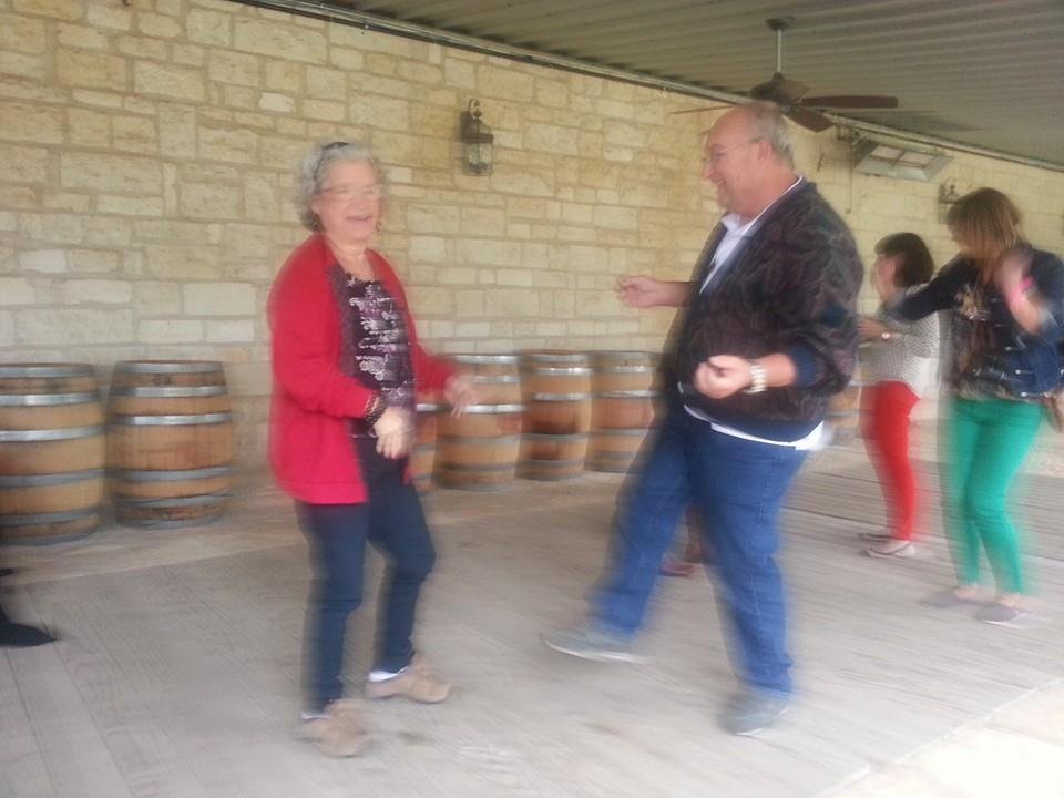 Gym Nellie and Dave "twisting" at a Fredricksburg winery.