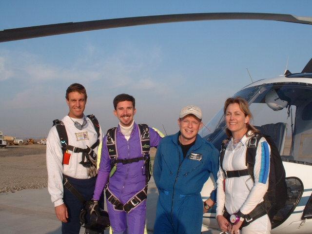 Some unknown person, myself, the pilot, and Joy.  Getting ready to go up and jump out of a helicopter at about 5,000 feet.  Fun stuff!