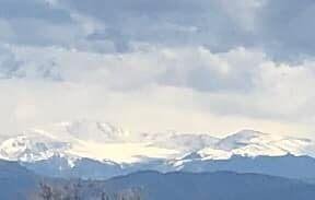 Clouds coming over Mt Evans into Denver just now, springtime in the Rockies.