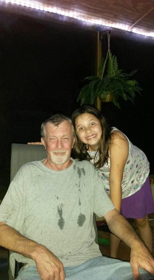 My grand daughter re styling my hair with a spray bottle