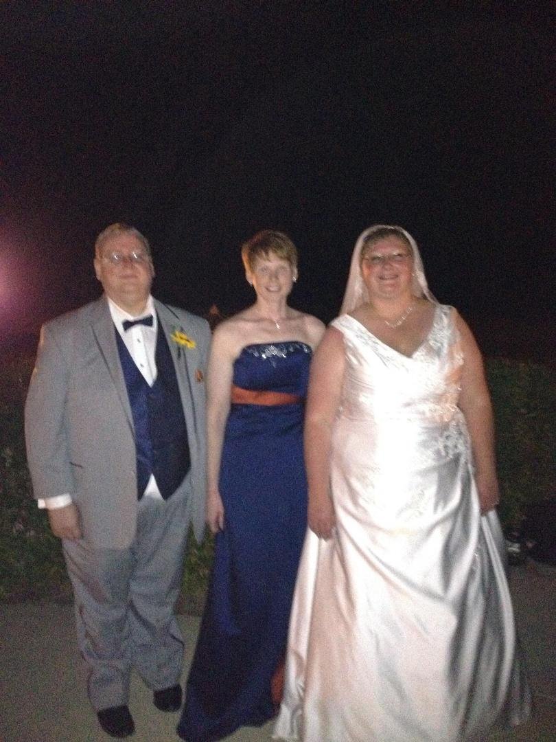 The 3 siblings...the bride, the maid of honor, and the guy who gave away the bride.